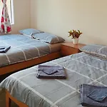 4 Beds Including 2 Double Beds, 1 Single Bed, And 1 Double Sofa Bed In A Small 1 Bedroom And 1 Lounge Studio No Kitchen Only Fridge, Microwave
