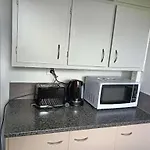 Served 3-Bedroom House A Including 5 Double Beds, 1 Single Bed, And 2 King Sofa Beds